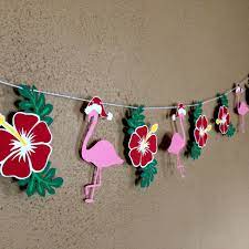 We pay attention to every detail and put lots of thought and creativity into making an ornament that you can bring back home to remind you of your special holiday here on maui with family and friends. Tropical Hawaiian Christmas Garland Christmas In July Hawaii Etsy Hawaiian Christmas Tropical Christmas Decorations Christmas In July