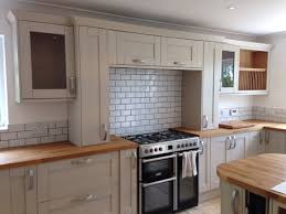 Expert advice for mixing materials comes from melissa klink from harvey jones, 'a wooden worktop adds warmth in a kitchen, but is it a soft material which can. Grey Coloured Kitchen With Solid Oak Worktop And White Brick Tiling Wood Worktop Kitchen Interior Kitchen Design