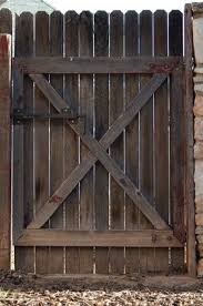 How To Build A Double Gate For A Wood Privacy Fence Ehow Wood Fence Gates Wood Privacy Fence Building A Wooden Gate