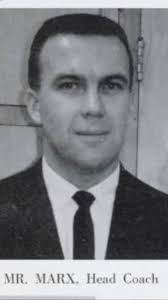 My dad. Ed Marx, chemistry teacher, and head football coach.