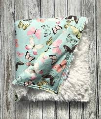 A japanese butterfly lace inspired blanket featuring an extra wide rib pattern with a row of butterflies at each end. A Personal Favorite From My Etsy Shop Https Www Etsy Com Listing 601233069 Aqua And Cream Baby Bla Baby Girl Blankets Baby Outfits Newborn Minky Baby Blanket