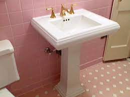 Marking the position of the bolt holes. Pedestal Sink Installation How Tos Diy