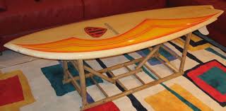 The effects of buoyancy are carefully observed in this energetic piece. 7 Surfboard Tables Ideas Surfboard Table Surfboard Surfboard Coffee Table
