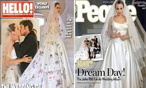 I wonder if jennifer aniston knows how visible. Angelina Jolie In Versace Wedding Dress With Brad Pitt In First Pictures Daily Mail Online