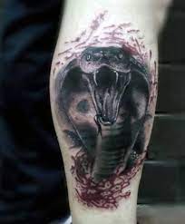 { 29 } snake color tattoo on leg for women. 61 Wonderful Snake Tattoos On Leg