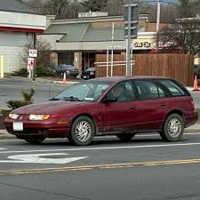 Image result for Bright Red 2000 Saturn