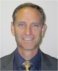 Design, development, and in-flight testing of a pointer/tracker for  in-flight experiments to measure aero-optical effects over a scaled turret