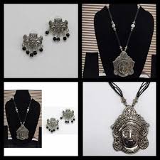 German Silver Designer Lord Durga Pendant with Black Dori Long Necklace  with Designer Stud Earring at ₹ 199/set