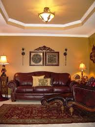 A cream accent chair adds light yellow to the space, while mustard and olive curtains add depth to the scheme. Wall Color With Burgundy Curtains Novocom Top