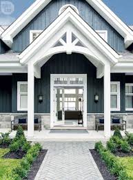 When it comes to entryway design ideas, there are so many things that one should take into consideration. Beefy Trim Work Makes For A Grand Entrance In This Ontario Cottage Modern Farmhouse Exterior Cottage Exterior Exterior House Colors