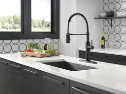 Choice of aerated stream or spray. Single Handle Pull Down Kitchen Faucet 18803 Bl Dst Delta Faucet