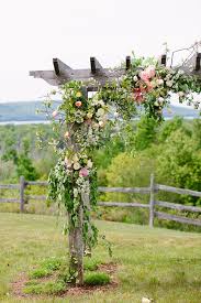 Wood Wedding Arch With Cascading Flowers Traverse City Wedding Michigan Wedding Venues Northern Michigan Weddings