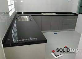 Brand new kitchen table made of stainless steel iron sheet gauge 1.2mmm top and bottom,legs and wire mesh are normal metal tube of 11\2 but well painted.size l4ft by w2ft by h33/inches. Solidtop Sdn Bhd Kitchen Cabinet Marble Granite Quartz Solid Surface Gallery Kitchen Cabinet