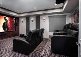 Our clients had 2 small children and already spent a lot of time in their basement, but needed a modern design solution to house their tv, video games, provide more storage, have a home office workspace, and conceal a protruding foundation wall. 75 Beautiful Basement Home Theater Pictures Ideas Houzz