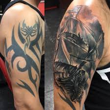 Middle top photo is after first laser treatment. Pin By Andre Youhana On Cover Up Tattoos Tribal Tattoo Cover Up Cover Tattoo Big Cover Up Tattoos