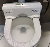 Self-cleaning toilet seat at New Orleans MSY Airport