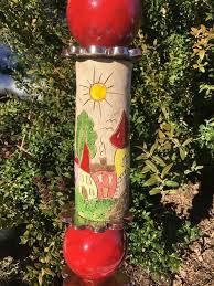 Stele In Rot Mit Hauser Motiven Garden Totems Stele Garden Art