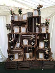 Rustic Wedding Theme Table Plan Using Wooden Crates Gin Bottles And Frames Wedding Table Decorations Diy Seating Plan Wedding Rustic Wooden Crates Wedding