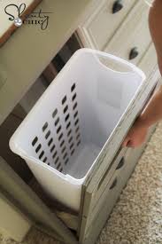 Plans for building a laundry hamper sorter that actually looks like a dresser. Diy Laundry Basket Dresser Shanty 2 Chic