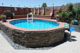 Above Ground Pool Installation Photos The Pool Factory Swimming Pools Backyard Swimming Pool Landscaping Above Ground Pool Landscaping