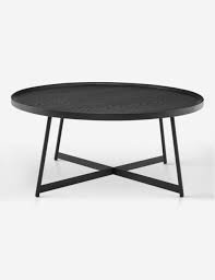 The round coffee table represents a blend of modern style and superior craftsmanship. Gweneth Round Coffee Table Black Ash