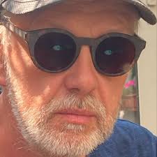 How to change paragraph style in all text frames across a document?