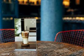 Download Premium Psd Of Mockup Of A Restaurant Table Sign Board 533971 Table Signs Restaurant Tables Signboard