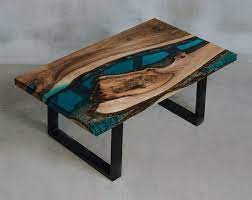 A coffee table is the centrepiece of any living room or lounge, and is one of the most important pieces of furniture in the home. Aria Iv Bespoke Blue Resin Coffee Table Modern Wood Collections 3936 Sena Home Furniture