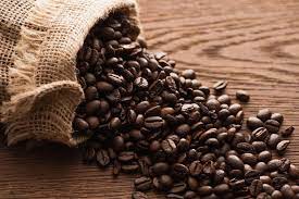 Lowest price per pound (whole bean): Fresh Roasted Coffee Beans Scattered From Sack On Wooden Table Free Stock Photo And Image