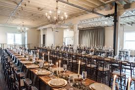 Brik Venue Fort Worth Texas Event Venue Wedding Venue Industrial Warehouse Historic Brick Walls Wood Vintage Rentals Gray Linen Napkins Decor
