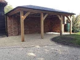We can lay a concrete base or even a block paved floor for your carport and lay a new driveway on a concrete base so it does. Oak Car Port House With Porch Carport Carport Designs