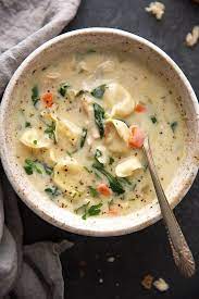 Creamy Chicken Tortellini Soup A Creamy Chicken Soup With Tons Of Carrots Baby Spinach An Tortellini Soup Recipe Tortellini Recipes Chicken Tortellini Soup