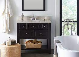 Simple yet efficient setting for a small makeup vanity table in a bedroom made with the use of a wooden desk with a white coat of paint and an aluminum frame painted in a gold, reflective color. Choosing A Bathroom Vanity Sizes Height Depth Designs More Hayneedle