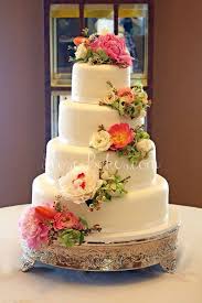 White Wedding Cake With Cascading Fresh Flowers Rose Bakes Wedding Cakes With Flowers Wedding Cake Fresh Flowers Simple Wedding Cake