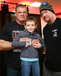 Legendary Wwe Superstars Brothers Of Destruction Kane Glenn Jacobs And The Undertaker Mark Calaway With Glenn S Gran Wwe Live Events Kane Wwe Wwe Couples