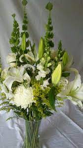 Green Pleasant Hills Bouquet White Casa Blanca Lillies Green Fuji Mums White Football Mums Bells Of Ireland Flower Arrangements White Bouquet Wedding Flowers
