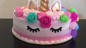 Unicorn head drawing on a quarter sheet cake with rainbow. Easy Store Bought Diy Unicorn Cake Youtube