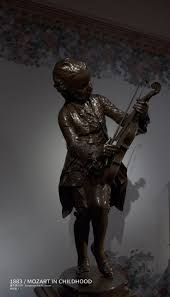 1883 童年莫扎特欧洲艺术馆藏1883 mozart in childhood european art museum 这尊雕像的石膏版本在1883年的沙龙中展出1887年起由斐迪南铸造厂制作青铜版本巴黎奥赛博物馆和音乐博物院均有收藏作者lou greek statue statue sculpture