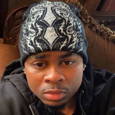 Looping: How Downtown Cruising Became a Symbol of Pride, Not a Problem”  It's a Friday night in Davenport. The sun dips behind the skyline, the  streetlights hum to life, and the lot