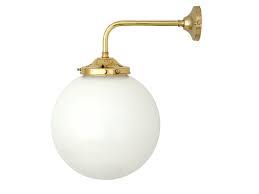 Clear glass globes encase a more organic globe form in these pendants from drechsel studio. Handmade Wall Lamp Bamako 250mm Clear Globe Wall Light By Mullan Lighting