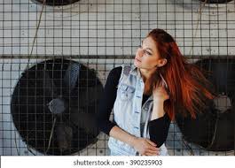 Lifestyle portrait of a young attractive woman with a skateboard · closeup of fresh red raspberries in glass with blue plastic spoon resting on small pink . Outdoor Fashion Lifestyle Portrait Pretty Young Stock Photo Edit Now 390235903