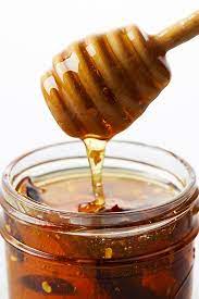 This Spicy Honey Is Our New Condiment Obsession Hot Honey Recipe Honey Recipes Spicy Honey