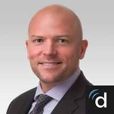 Dr. Adam L. Booth, MD