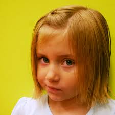 Two braided ponytails with beads for little girls. 20 Little Girl Haircuts Learn Haircuts