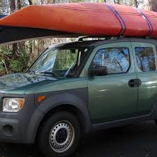 With the cargo on your roof, lay the safety strap across the width of your cargo. How To Strap A Kayak To A Roof Rack