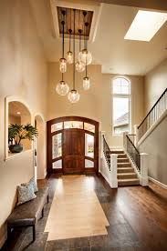 Large chandeliers are an elegant choice of lighting for kitchens and dining rooms too, adding that extra decorative element for special occasions and dinner parties. Large Entryway Chandelier Color Stabbedinback Foyer Design Entryway Chandelier Best Modern House Design