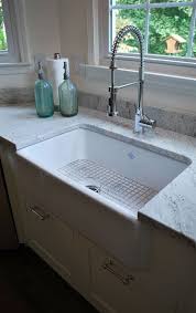 Kitchen Sink Is A Key Element Of Great Kitchen Design Find Ideas From These Distinctive Ki Farmhouse Sink Kitchen Trendy Farmhouse Kitchen Kitchen Sink Design