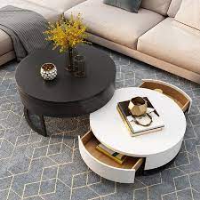 This is suitable for storing more items than required and the lower level allows you to easily store different types of items, such as books, toys. Modern Round Coffee Table With Storage Lift Top Wood Coffee Table With Rotatable Drawers In White Black