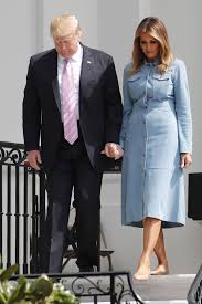That your arms go in the sleeves? Melania Trump Cancels White House Easter Egg Roll See Her Past Looks Footwear News