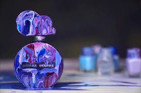 Coming in a light blue bottle, the cloud perfume sits atop a billowing cloud base, and features a lid with another small cloud. Alexa Meade Ariana Grande Asked Me To Paint Special
